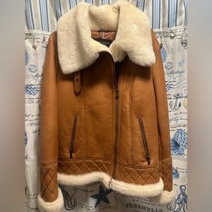 Brown leather jacket from London what is fox far in it never been worn